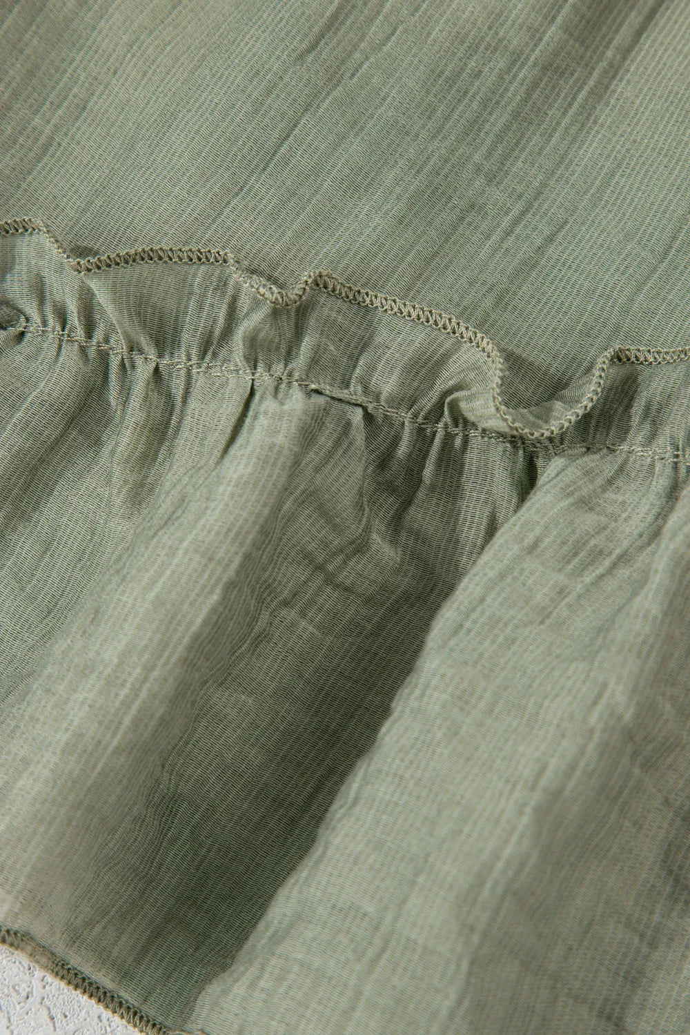 High-waist V-front Bermuda denim shorts with pockets.