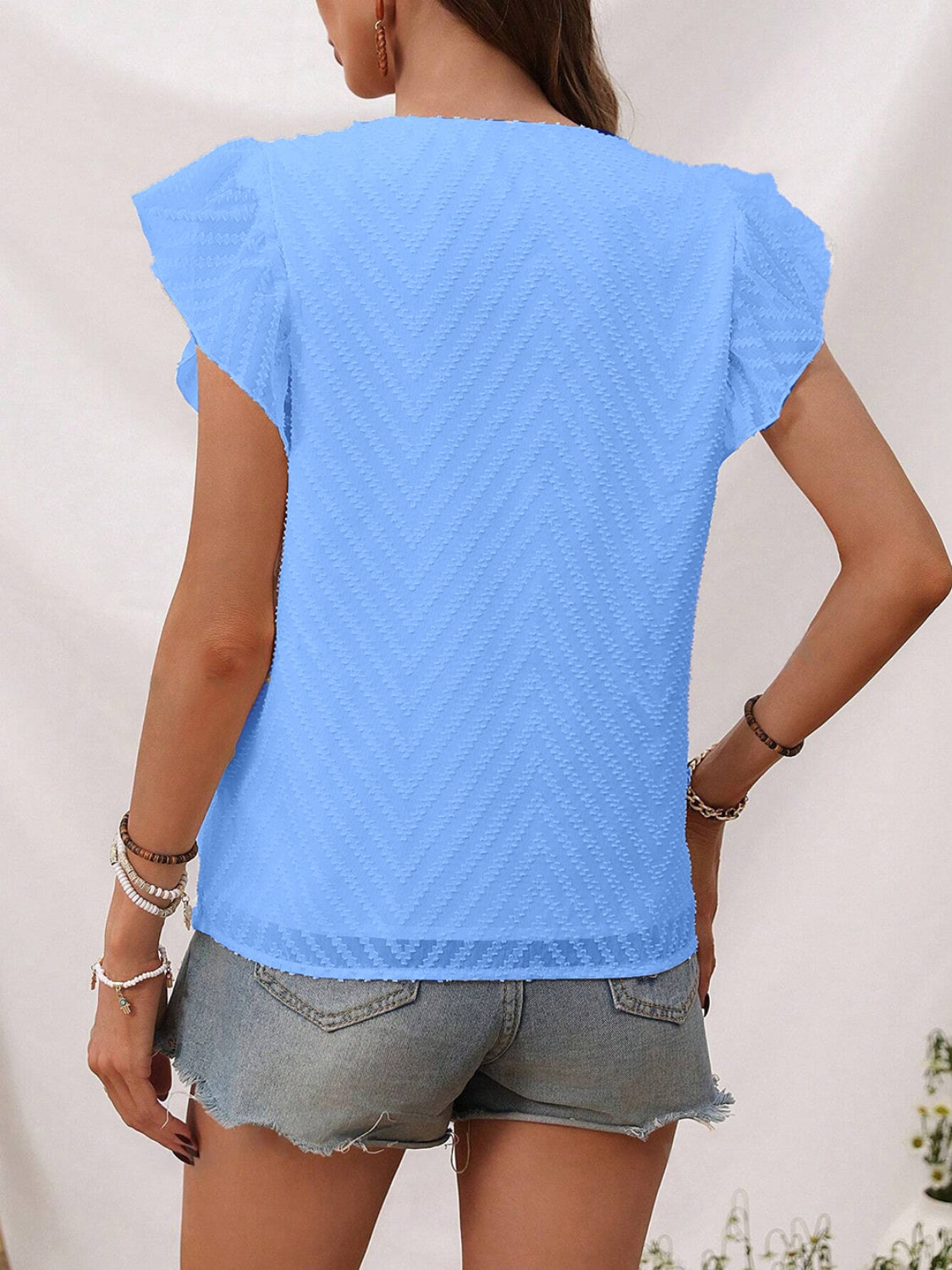 Textured V-Neck Cap Sleeve Blouse.