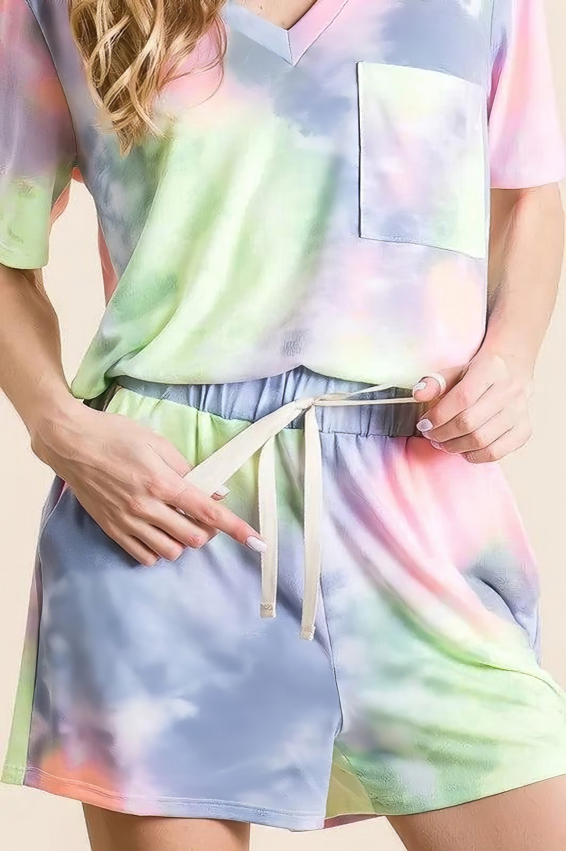 Tie dye casual shorts with twill tape drawstring and pockets.