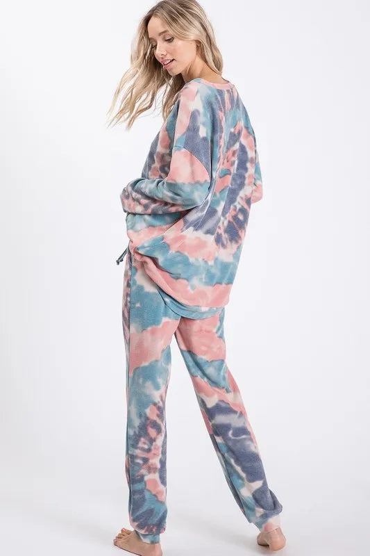 Tie dye French terry casual pants with drawstring and pockets.