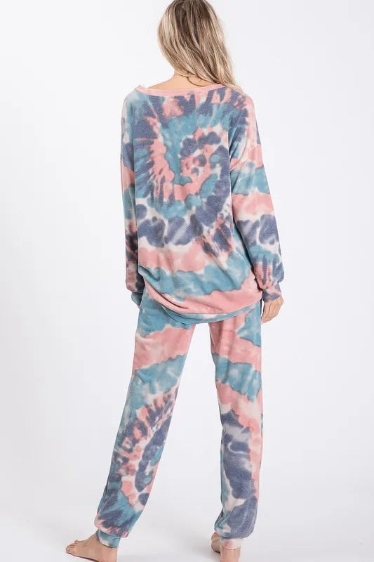 Tie dye French terry casual pants with drawstring and pockets.