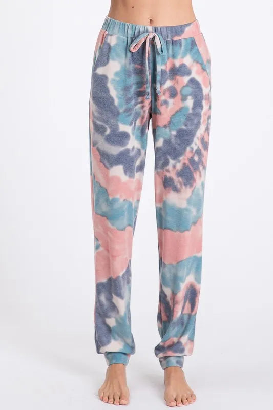 Tie dye French terry casual pants with drawstring and pockets.