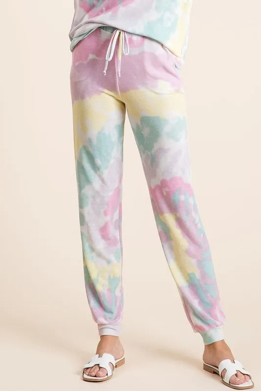 Tie dye French terry casual pants with drawstring and pockets.