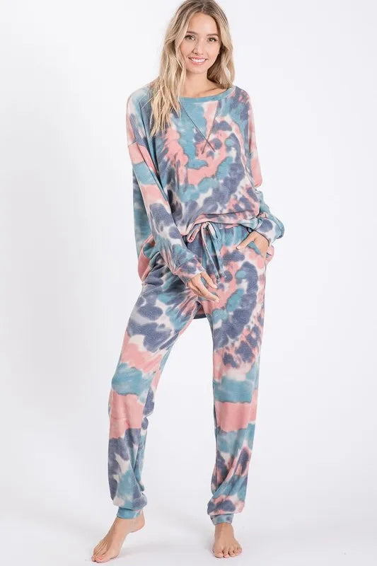 Tie dye French terry casual pants with drawstring and pockets.