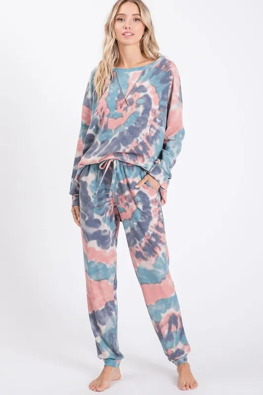 Tie dye French terry casual pants with drawstring and pockets.