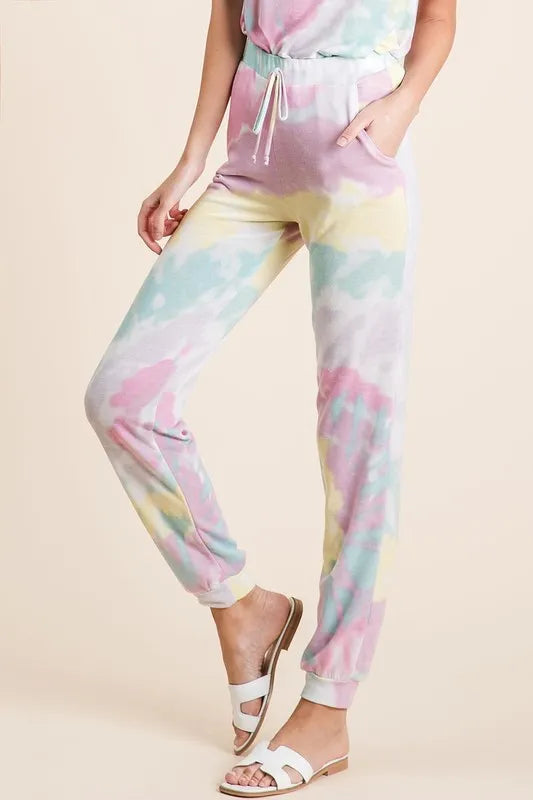 Tie dye French terry casual pants with drawstring and pockets.