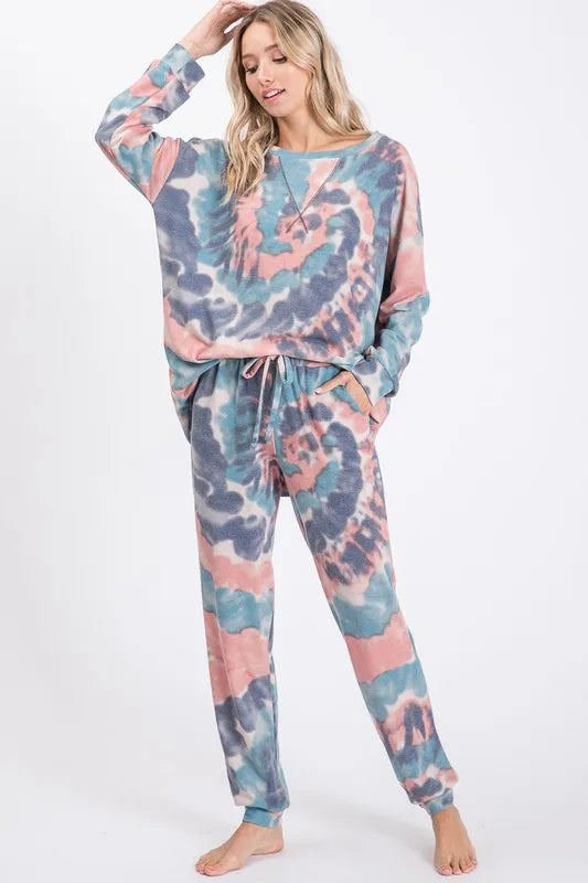 Tie dye French terry casual pants with drawstring and pockets.