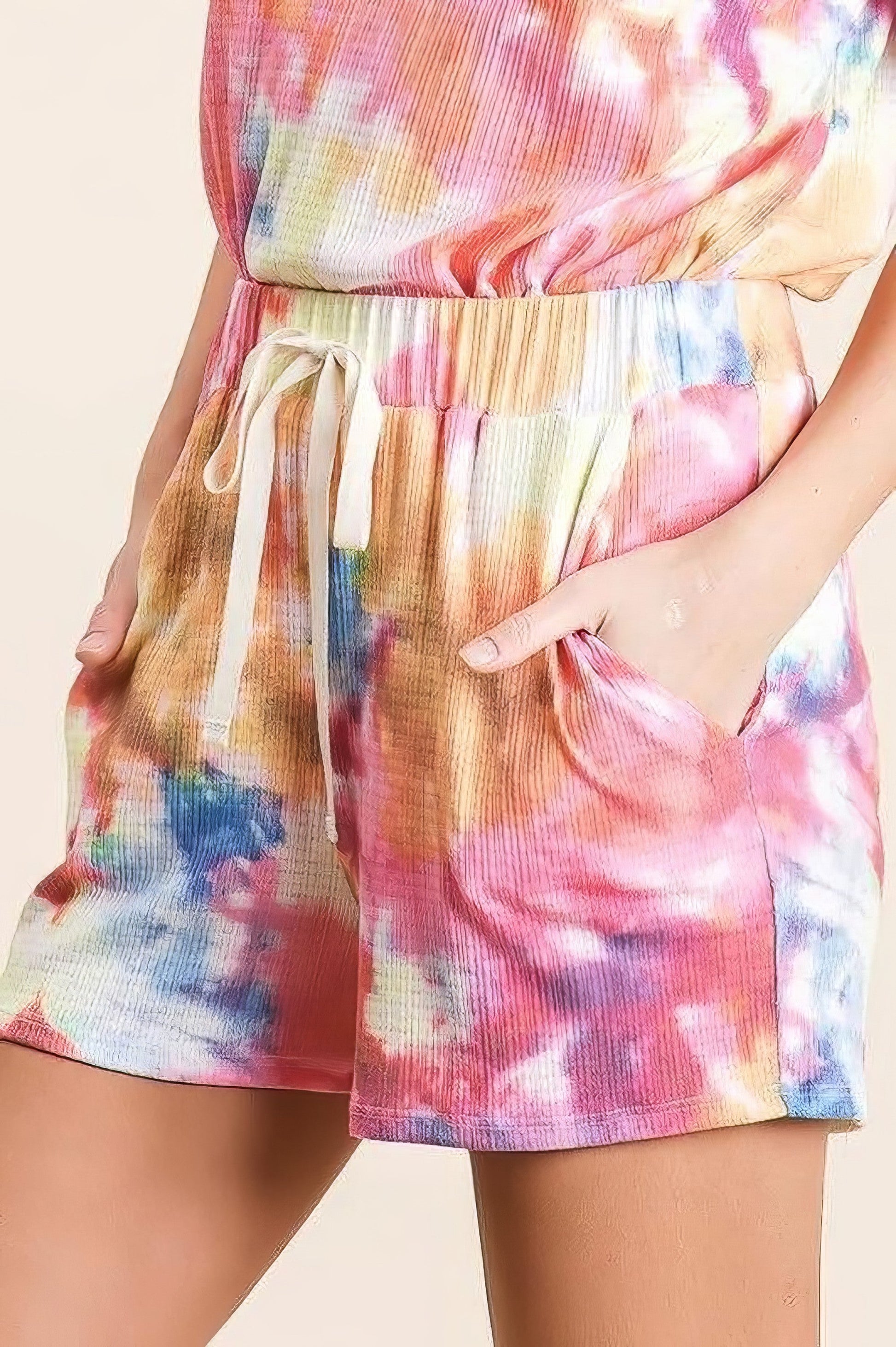 Tie dye French terry casual shorts with drawstring and pockets.