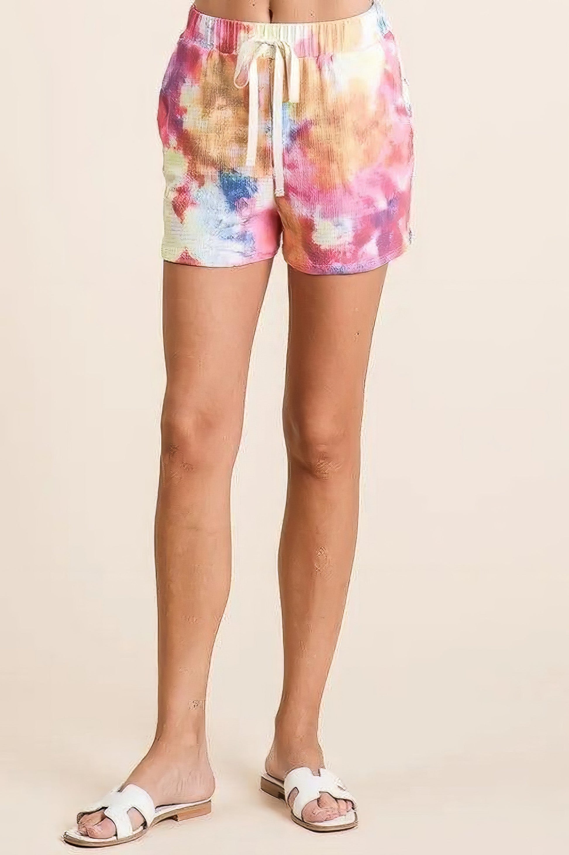 Tie dye French terry casual shorts with drawstring and pockets.