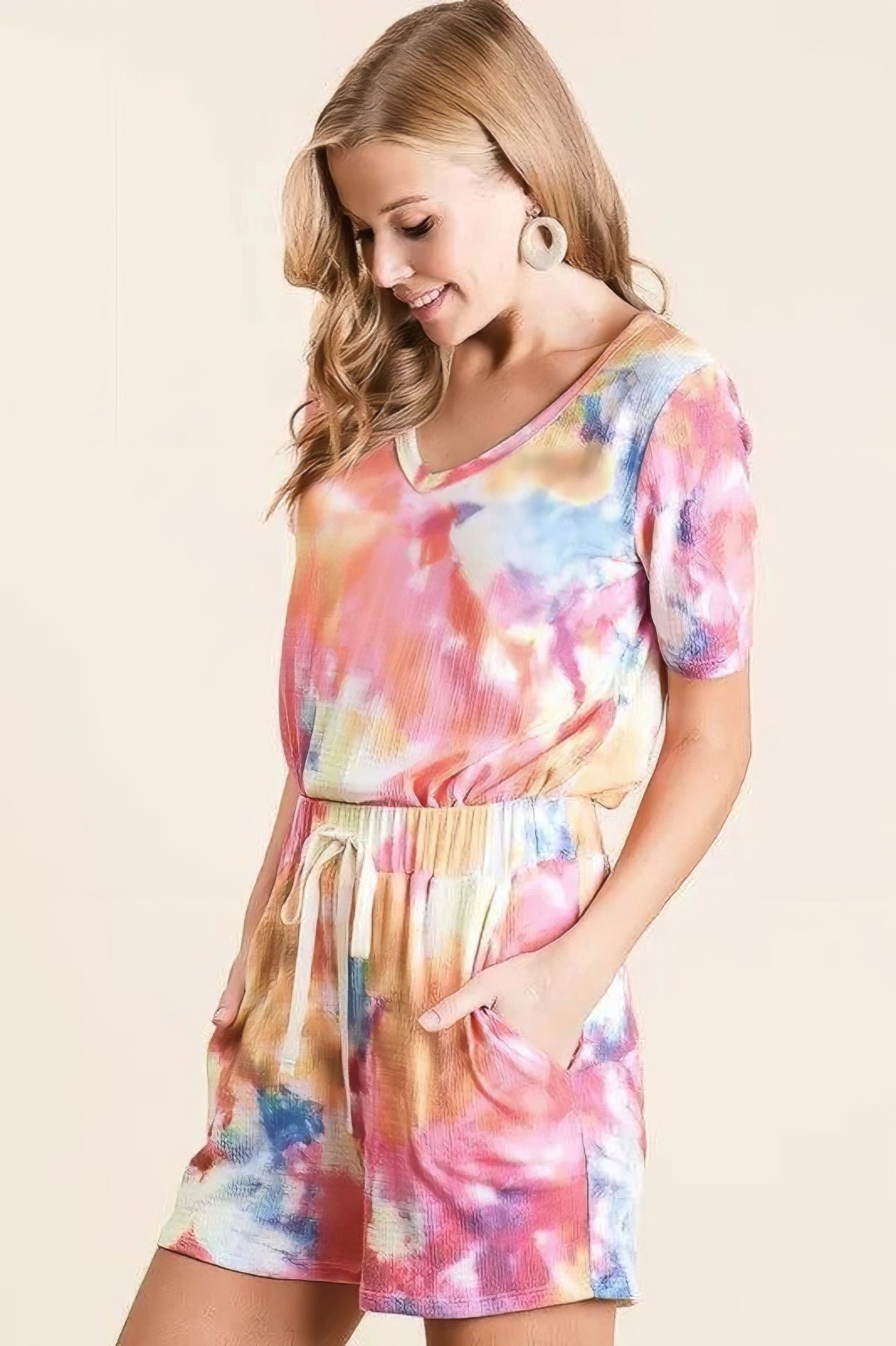 Tie dye French terry casual shorts with drawstring and pockets.