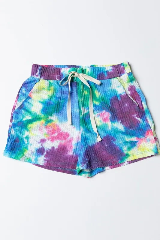 High-waist V-front Bermuda denim shorts with pockets.