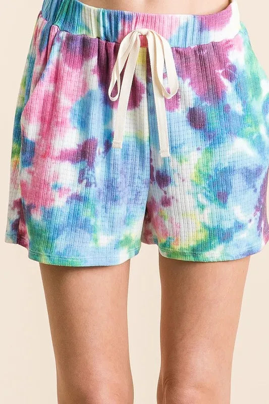High-waist V-front Bermuda denim shorts with pockets.