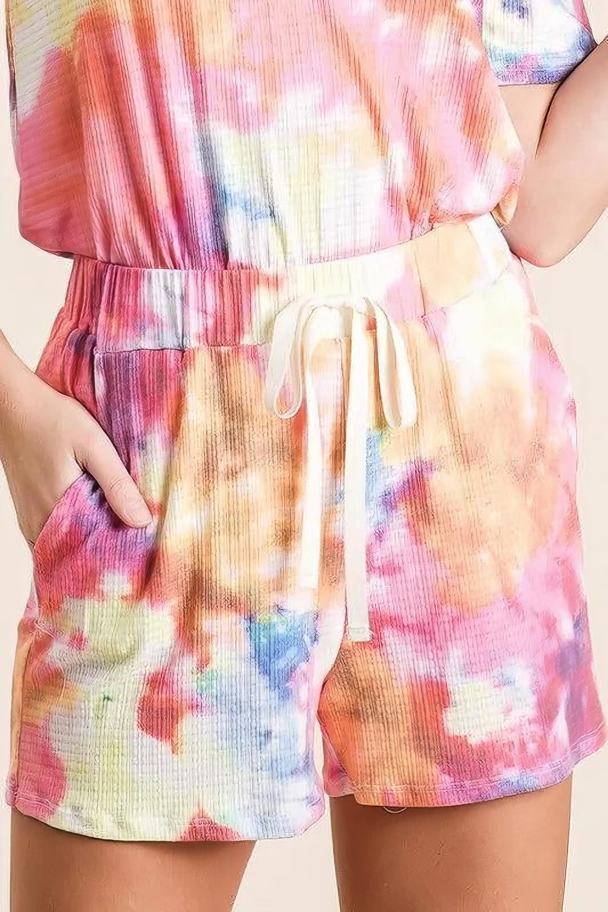 Tie dye French terry casual shorts with drawstring and pockets.