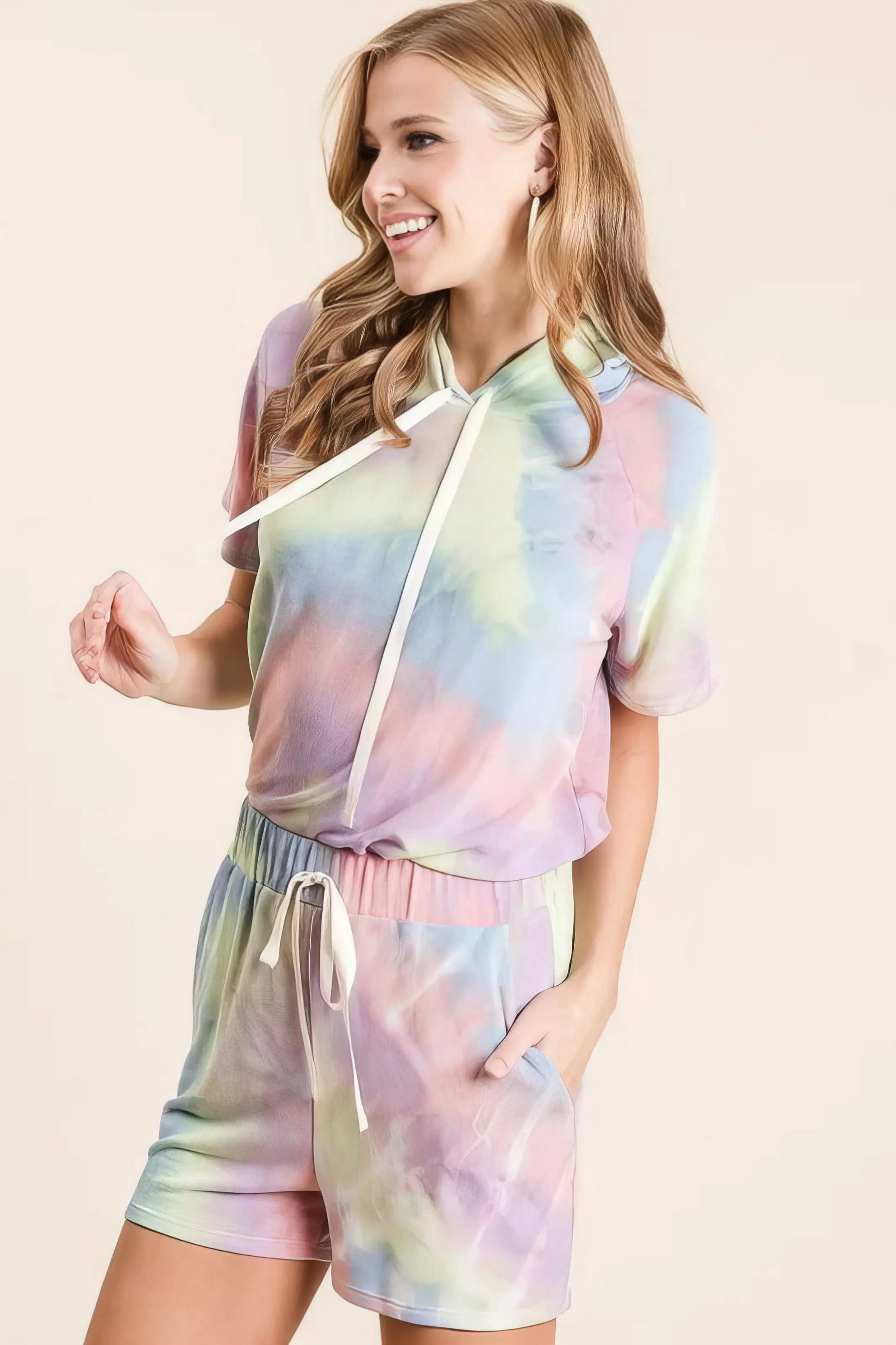 Tie dye french terry hoodie top and bottom set, women's cozy loungewear, trendy two-piece outfit, comfortable French terry fabric, stylish tie-dye pattern, practical pockets, drawstring hoodie, moderate stretch polyester, ideal for relaxing or casual outings