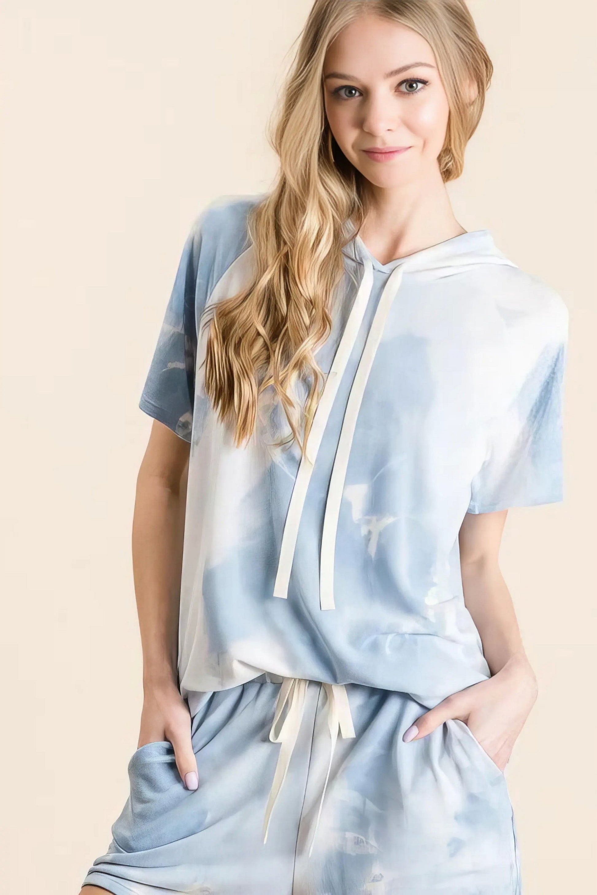 Tie dye french terry hoodie top and bottom set, women's comfortable two-piece outfit, stylish tie-dye pattern, soft French terry fabric, drawstring hoodie, practical pockets, moderate stretch polyester, ideal for lounging or casual wear
