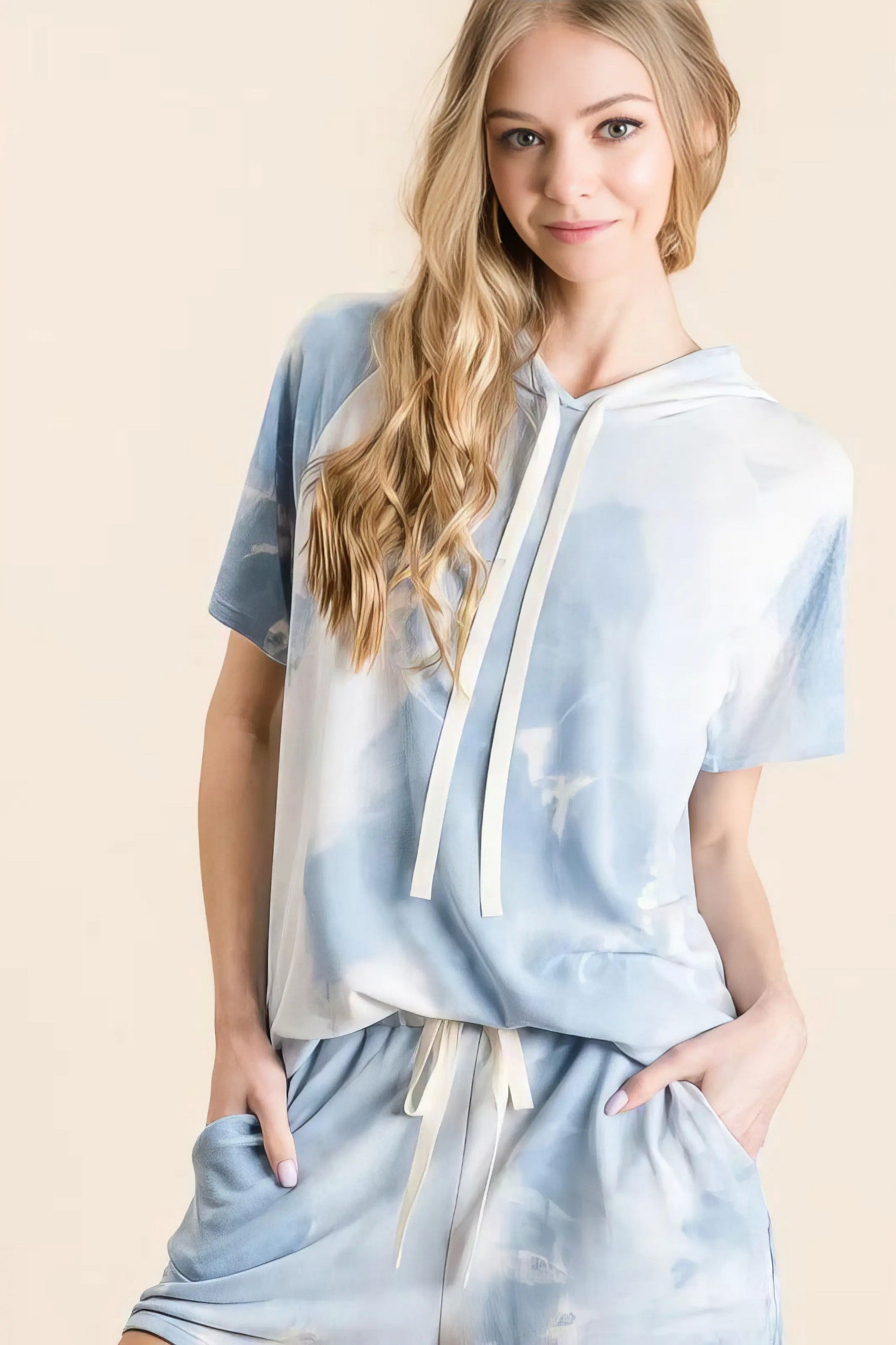 Tie dye french terry hoodie top and bottom set, women's comfortable two-piece outfit, stylish tie-dye pattern, soft French terry fabric, drawstring hoodie, practical pockets, moderate stretch polyester, ideal for lounging or casual wear