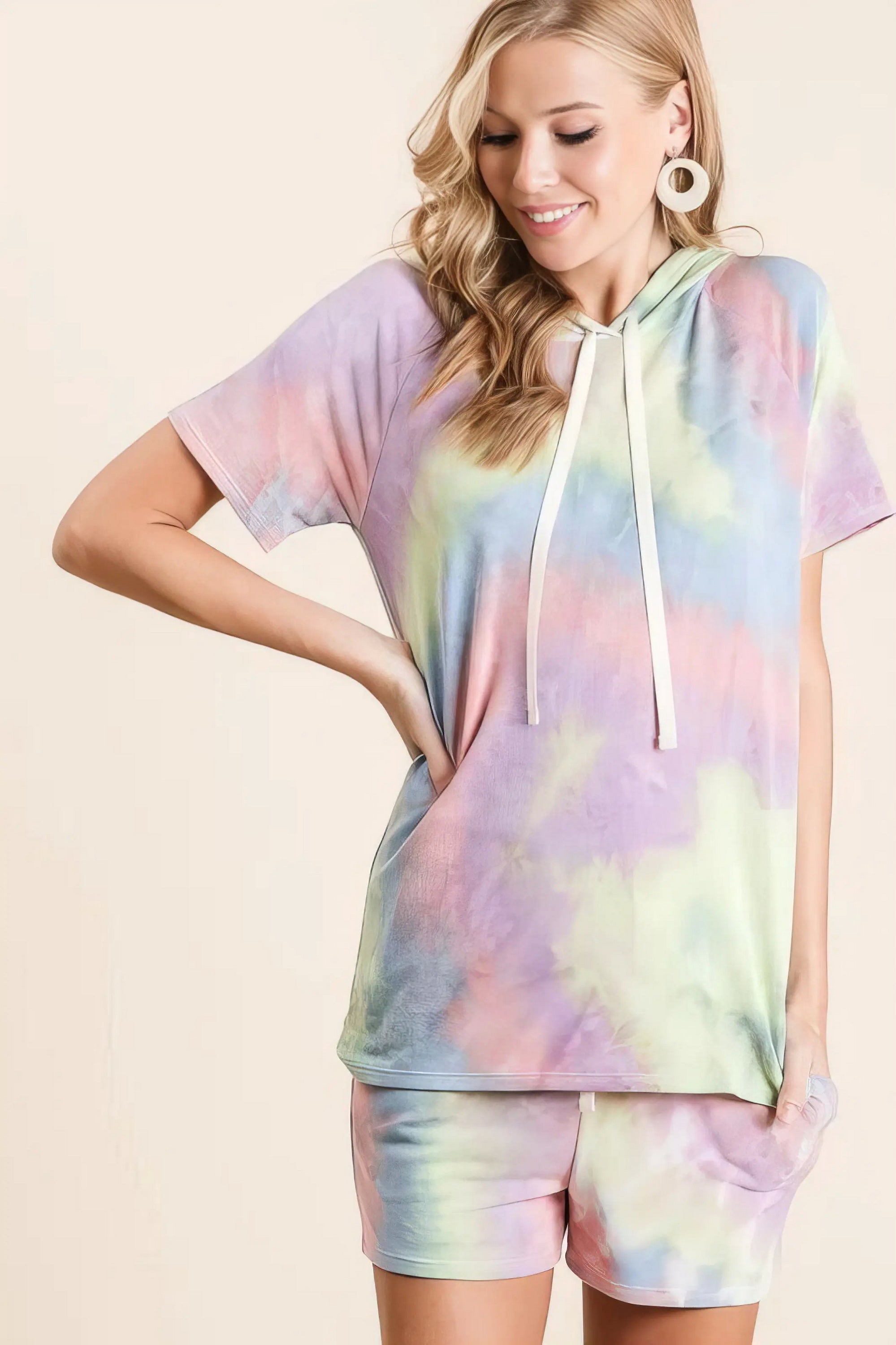 Tie dye french terry hoodie top and bottom set, women's cozy loungewear, trendy two-piece outfit, comfortable French terry fabric, stylish tie-dye pattern, practical pockets, drawstring hoodie, moderate stretch polyester, ideal for relaxing or casual outings