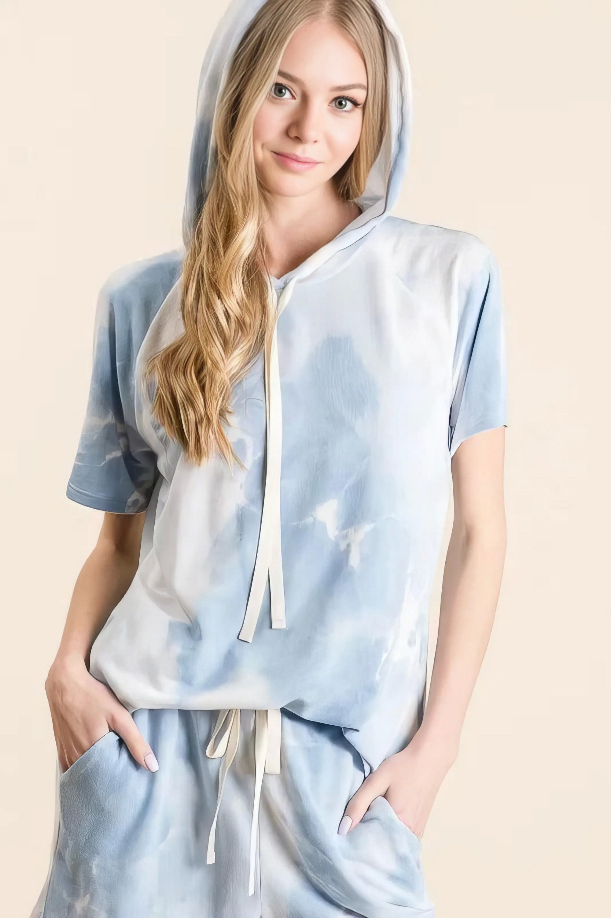 Tie dye french terry hoodie top and bottom set, women's comfortable two-piece outfit, stylish tie-dye pattern, soft French terry fabric, drawstring hoodie, practical pockets, moderate stretch polyester, ideal for lounging or casual wear