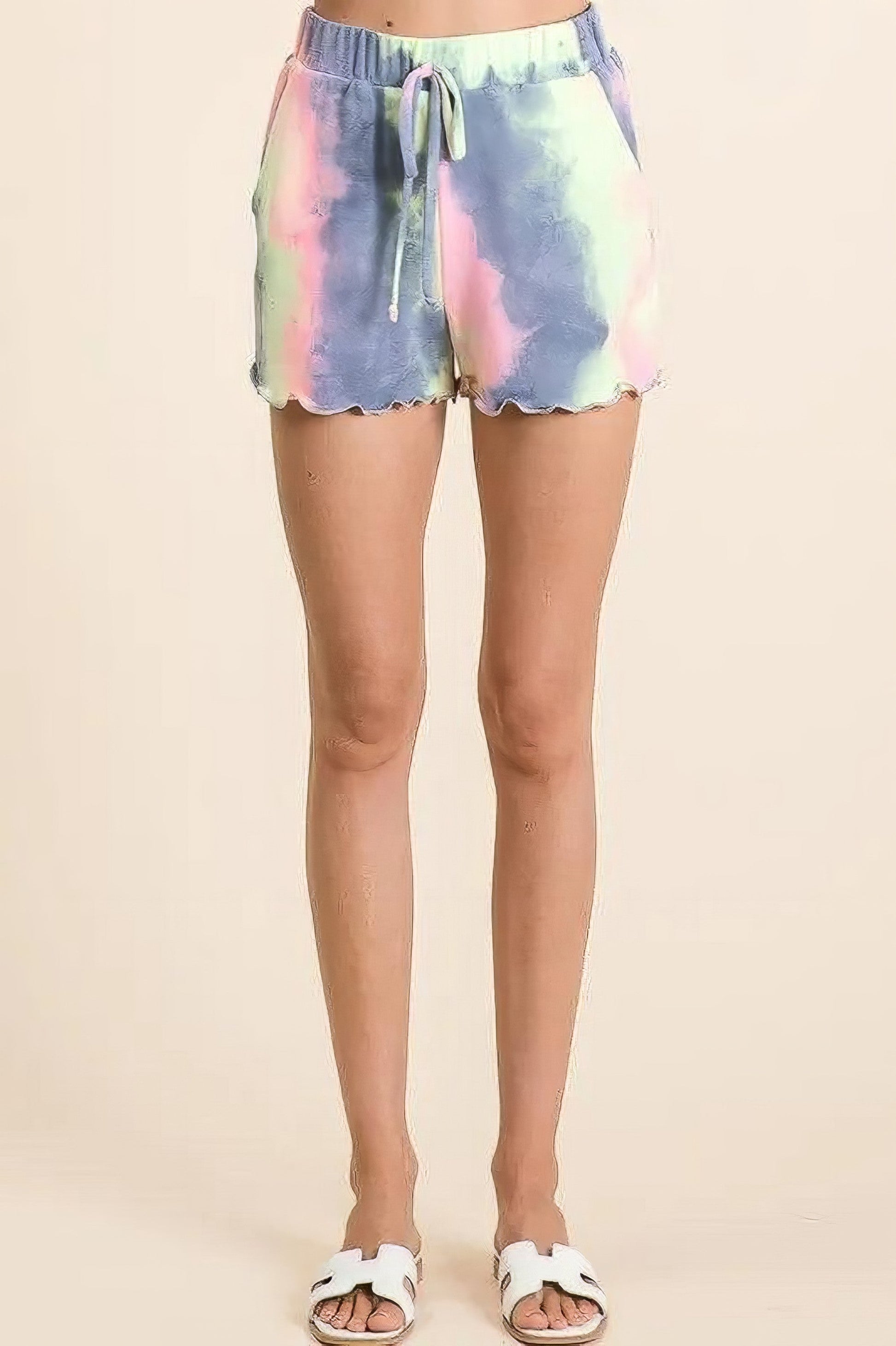 Tie dye French terry shorts with curly edge and drawstring.