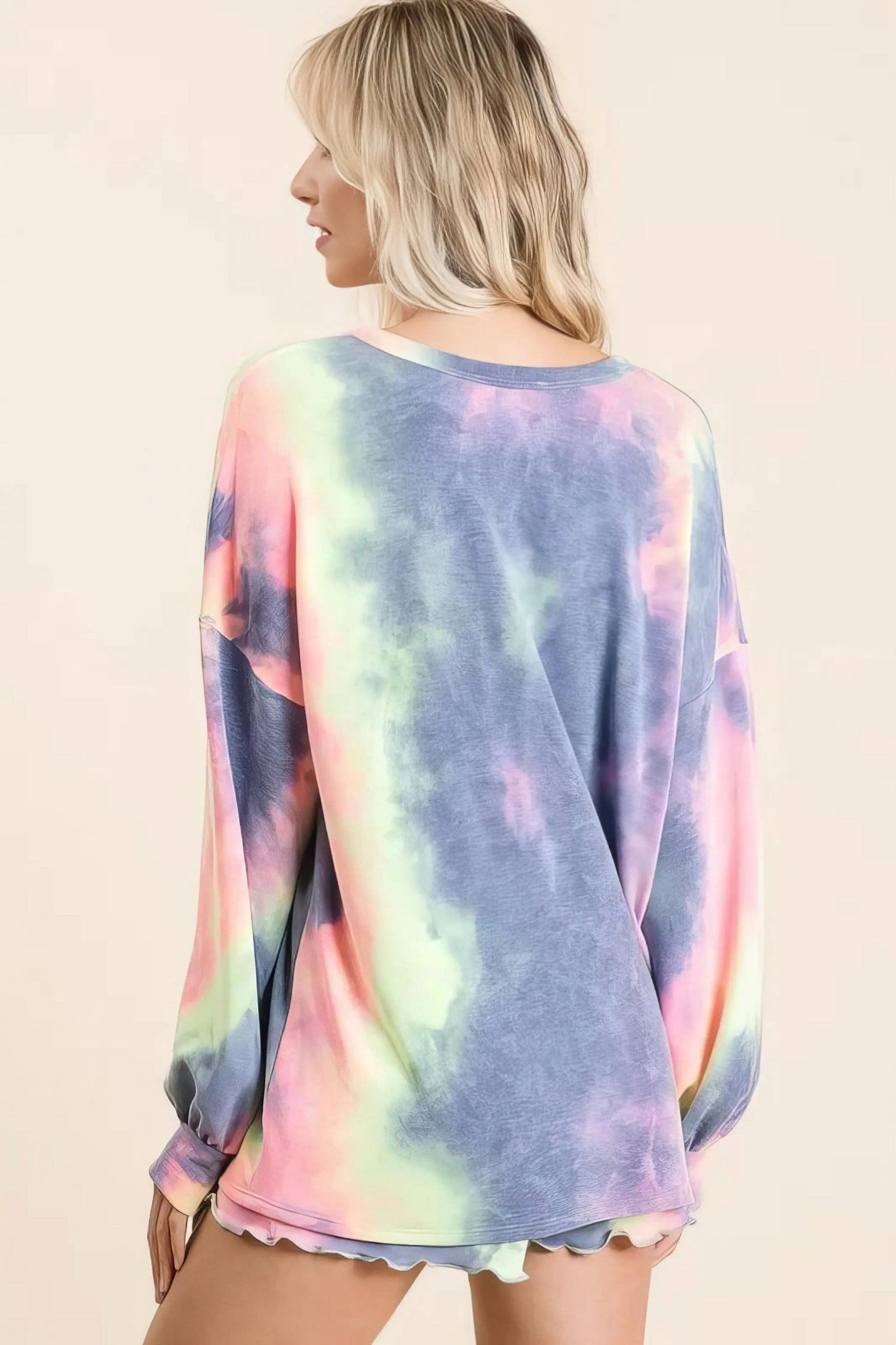 Tie dye french terry top and shorts set, women's fashionable two-piece outfit, comfortable French terry fabric, stylish tie-dye pattern, raw hem shorts, practical pockets, drawstring shorts, moderate stretch cotton, ideal for lounging or casual wear
