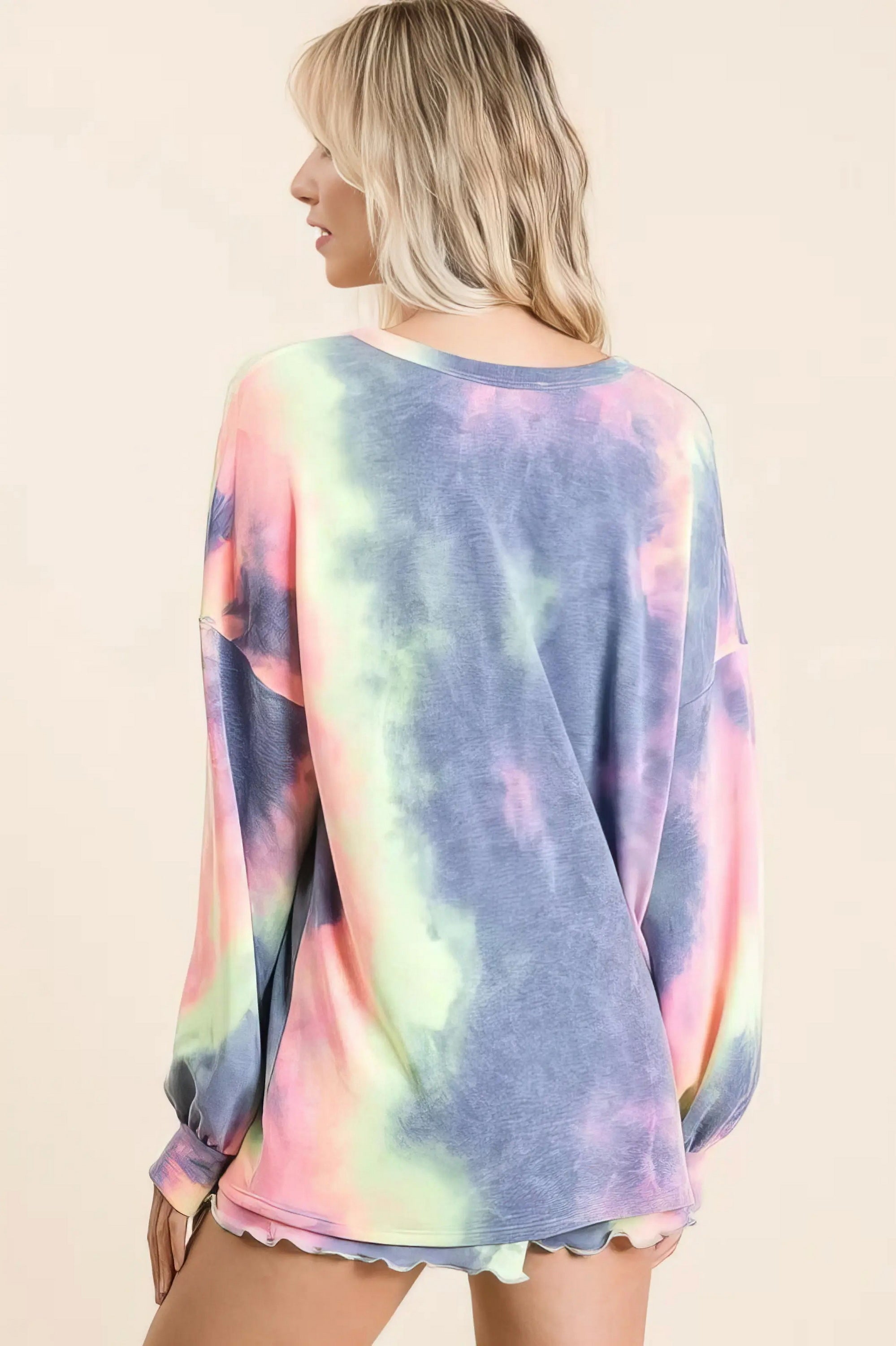 Tie dye french terry top and shorts set, women's fashionable two-piece outfit, comfortable French terry fabric, stylish tie-dye pattern, raw hem shorts, practical pockets, drawstring shorts, moderate stretch cotton, ideal for lounging or casual wear