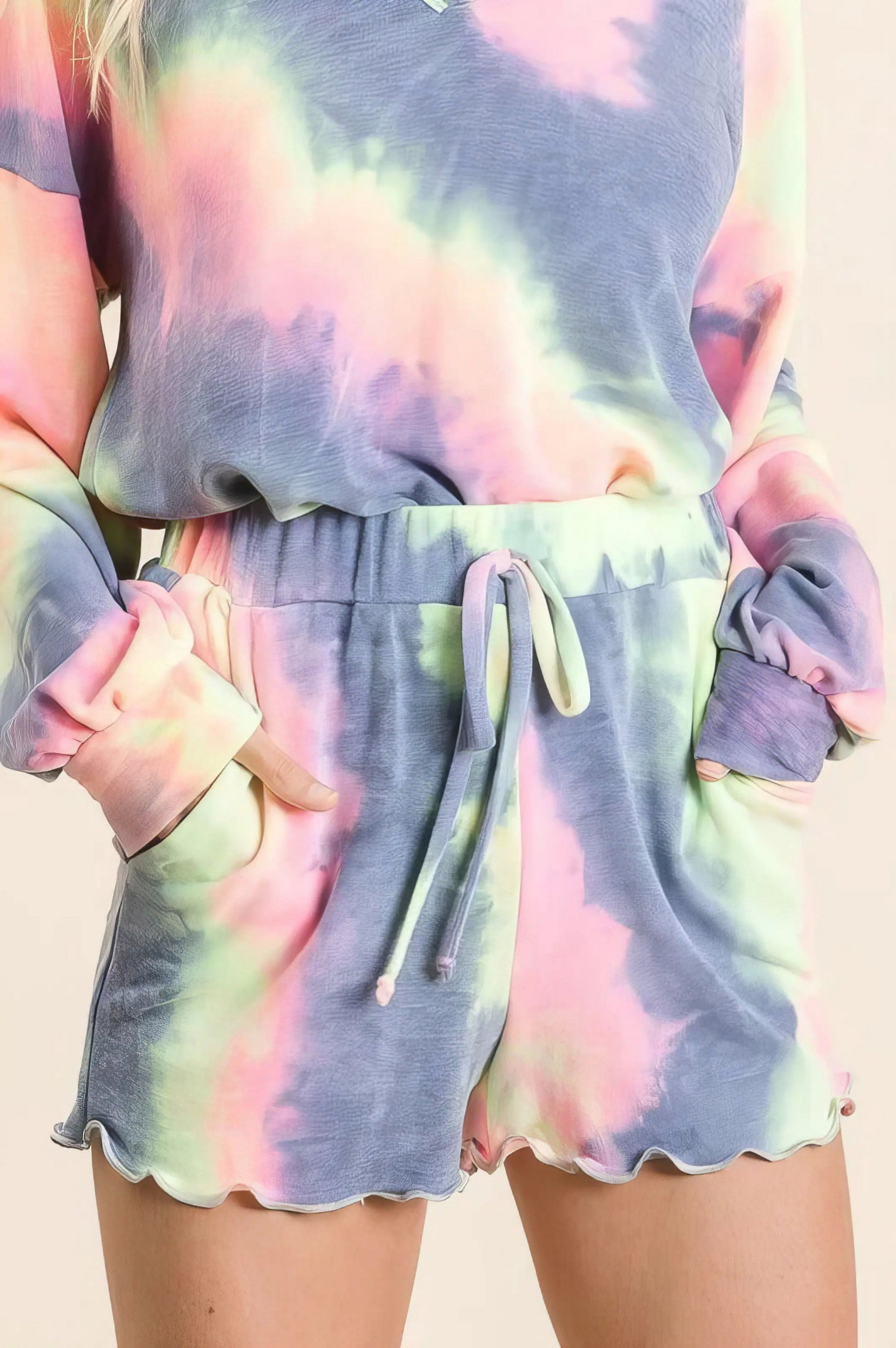 Tie dye french terry top and shorts set, women's fashionable two-piece outfit, comfortable French terry fabric, stylish tie-dye pattern, raw hem shorts, practical pockets, drawstring shorts, moderate stretch cotton, ideal for lounging or casual wear