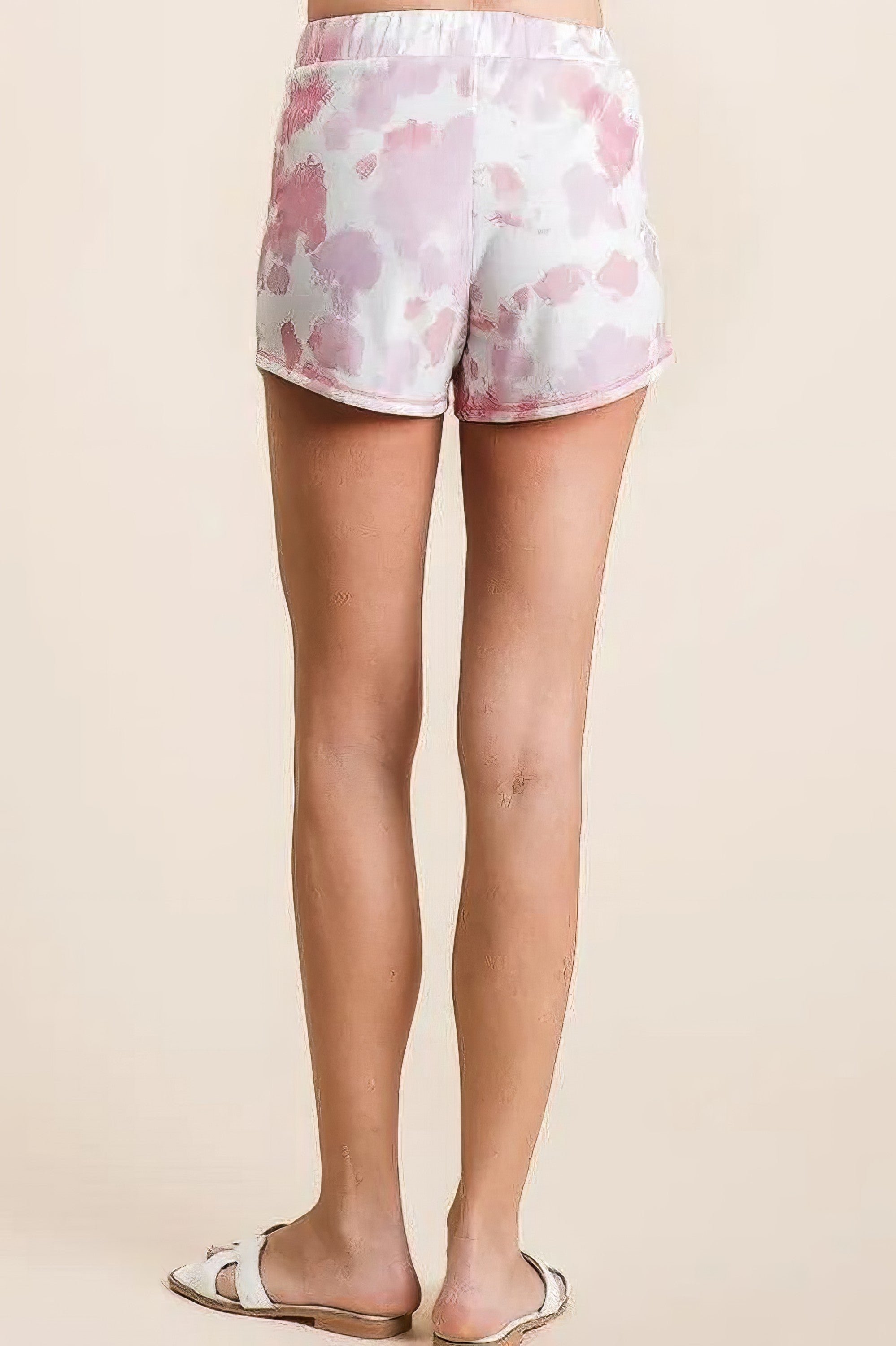 Tie dye print terry shorts with side pockets and drawstring.
