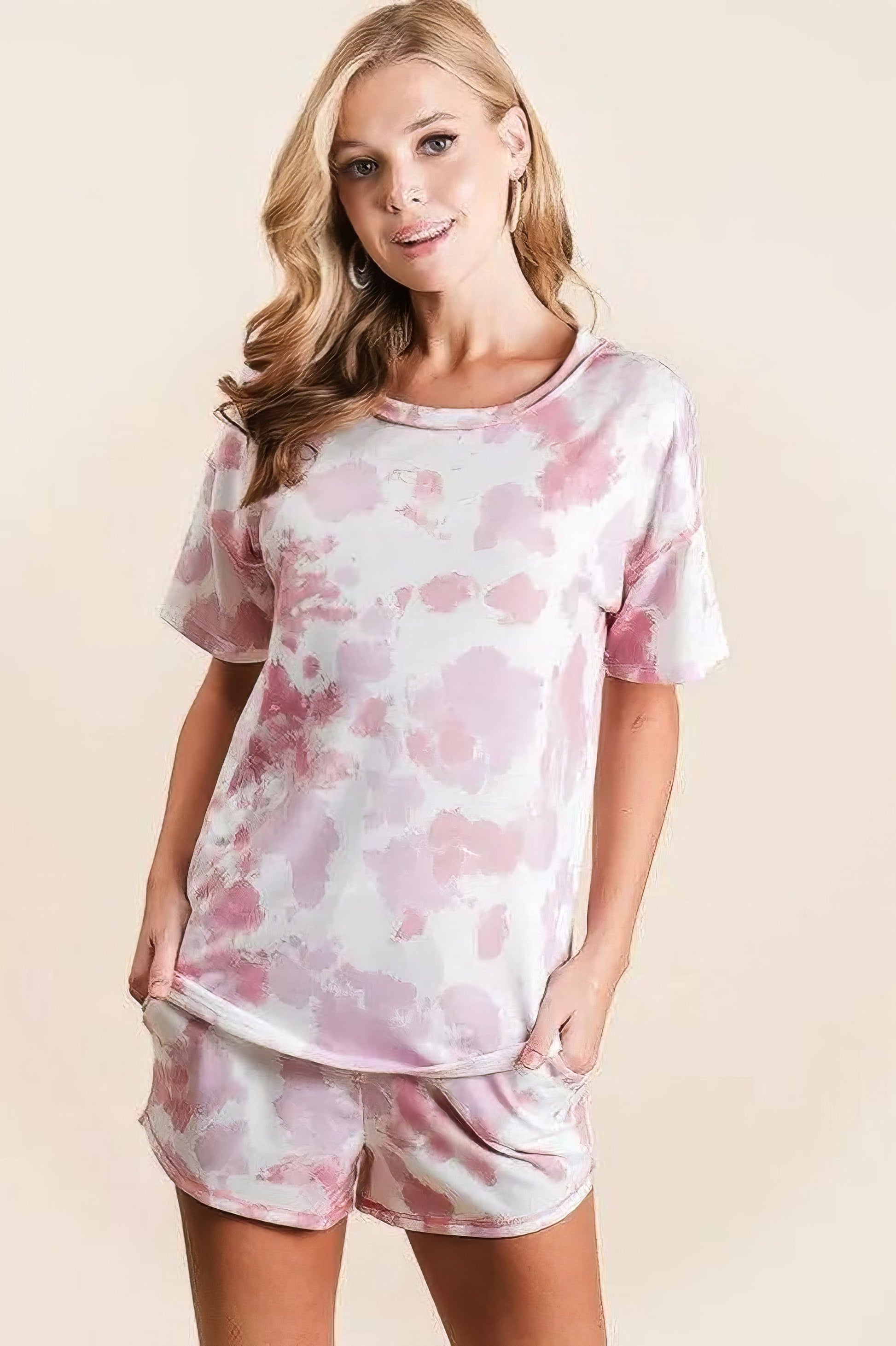 Tie dye print terry shorts with side pockets and drawstring.