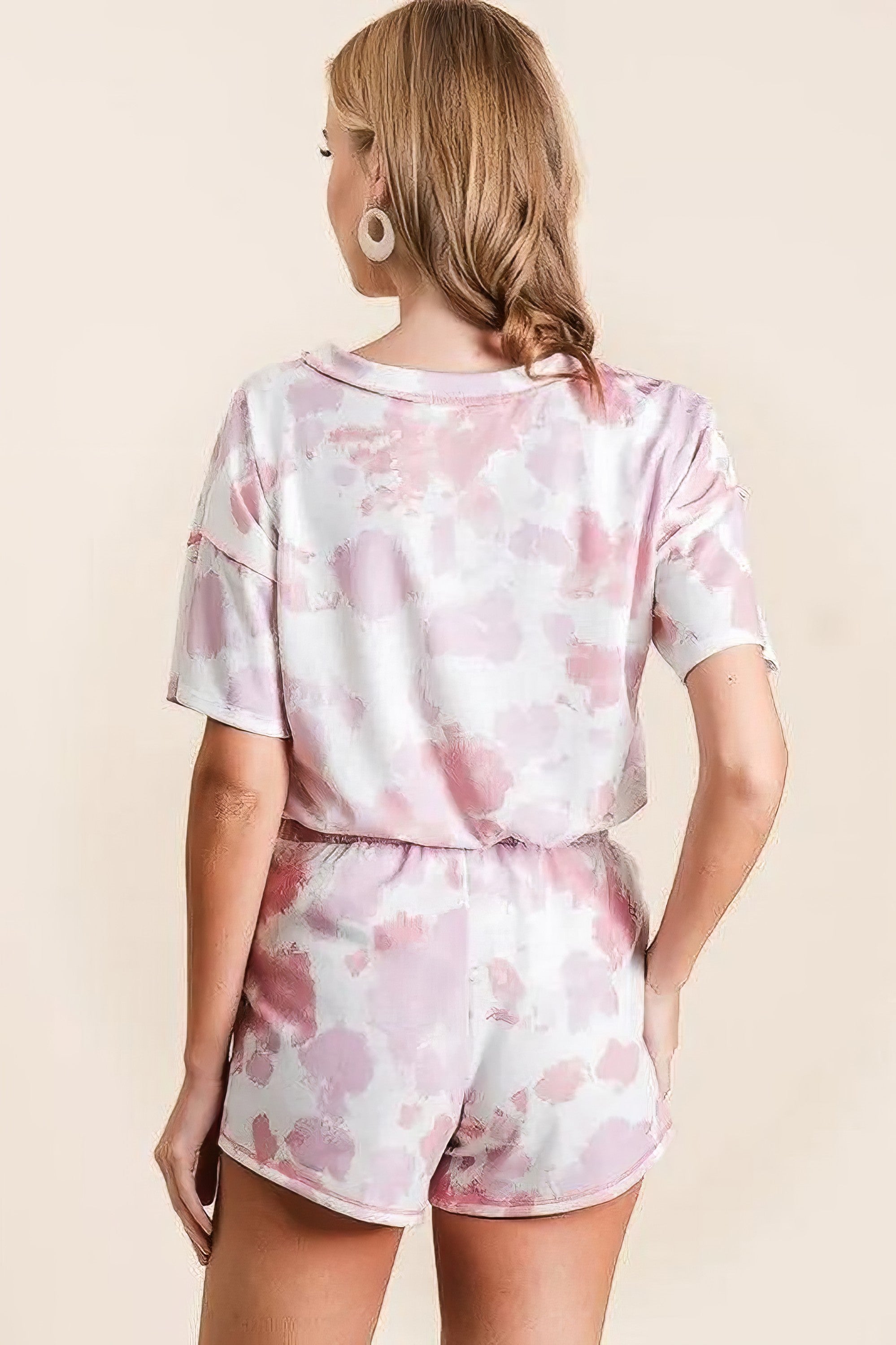Tie dye print terry shorts with side pockets and drawstring.