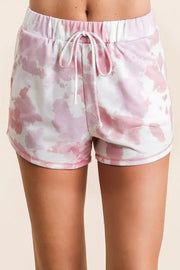 Tie dye print terry shorts with side pockets and drawstring.