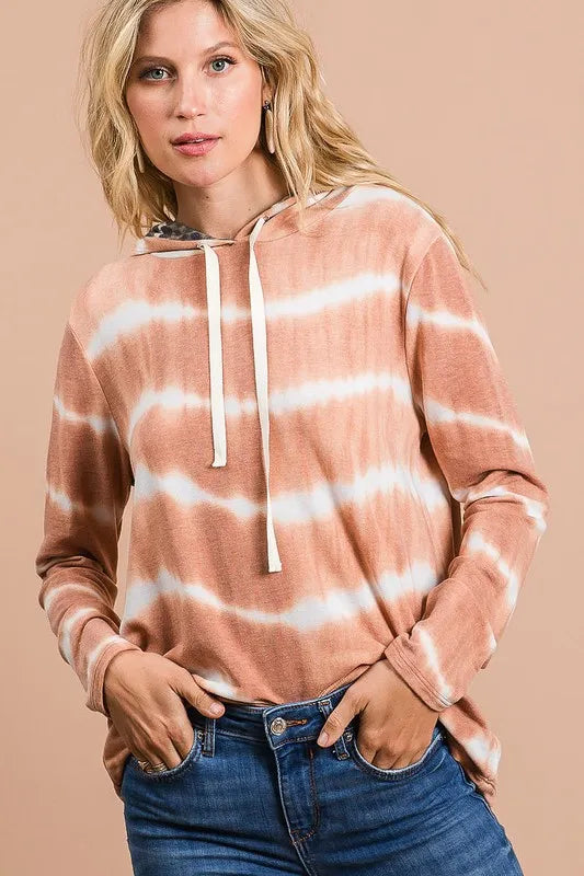 Tie dye stripe terry drawstring hoodie with leopard print accents.