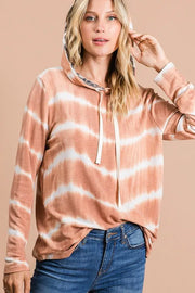 Tie dye stripe terry drawstring hoodie with leopard print accents.