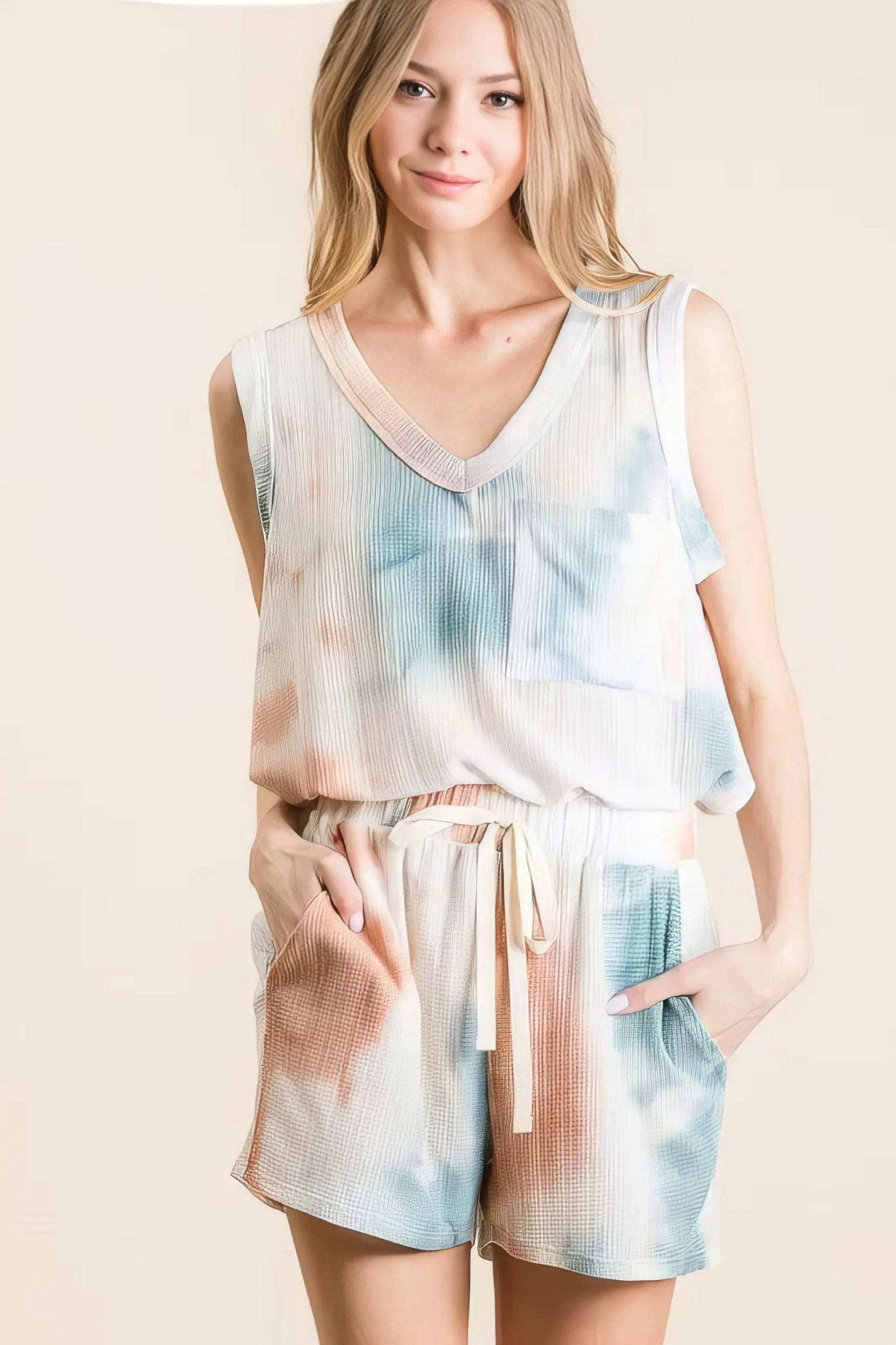 tie dye textured knit top and shorts set unique, distinct women's outfit, trendy two-piece set, colorful tie dye pattern, comfortable textured knit, stylish modern look, ideal for relaxed and fashionable wear
