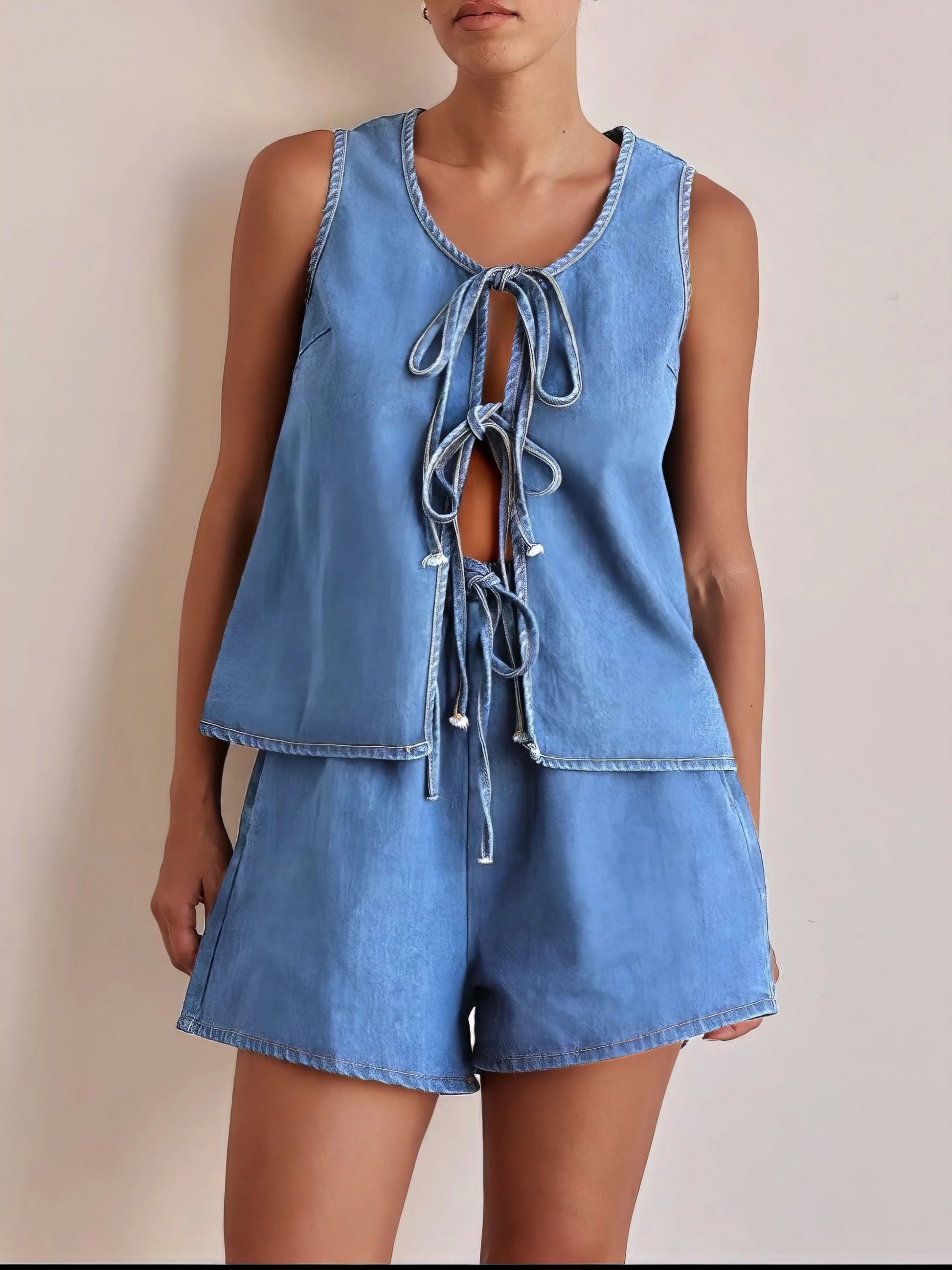 tie front vest and shorts denim set, chic edgy women's outfit, stylish two-piece set, trendy denim ensemble, comfortable vest top, fashionable denim shorts, perfect for a statement look