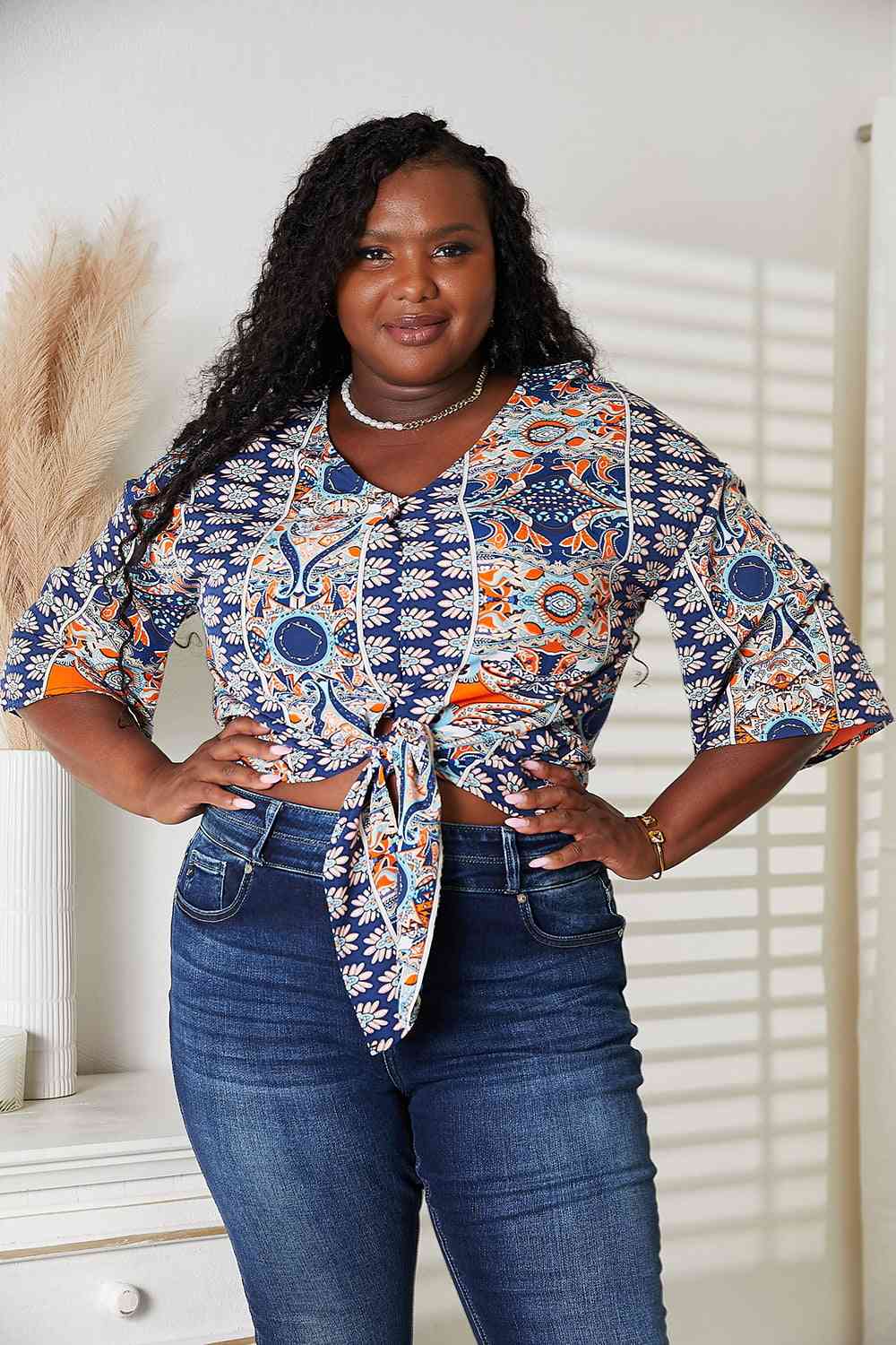 Tie Hem V-Neck Three-Quarter Sleeve Blouse.