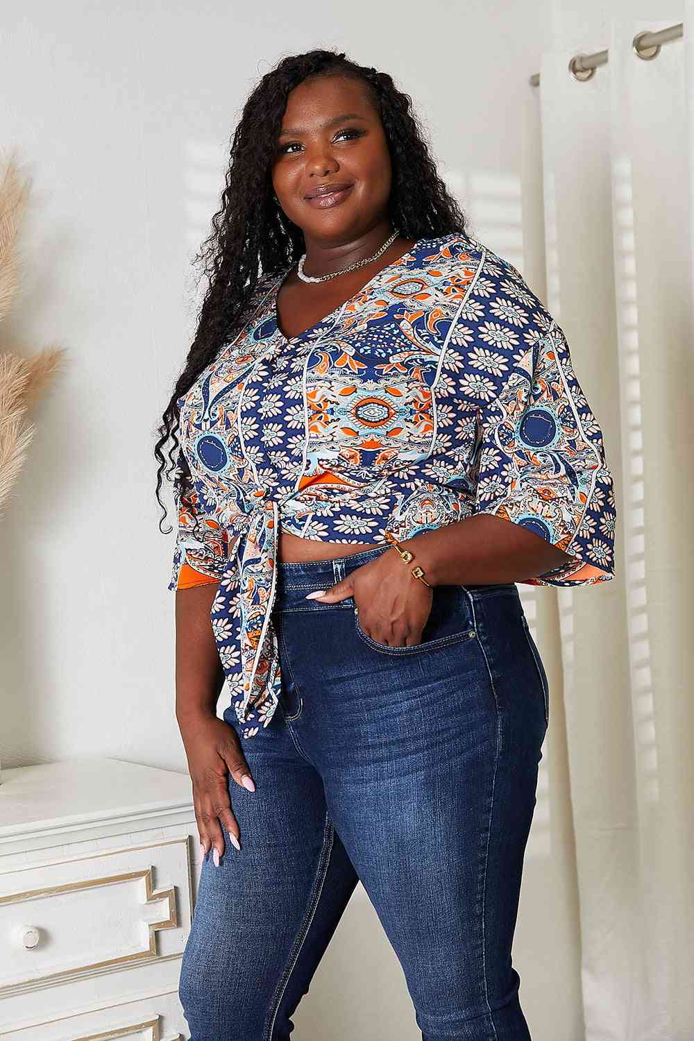 Tie Hem V-Neck Three-Quarter Sleeve Blouse.