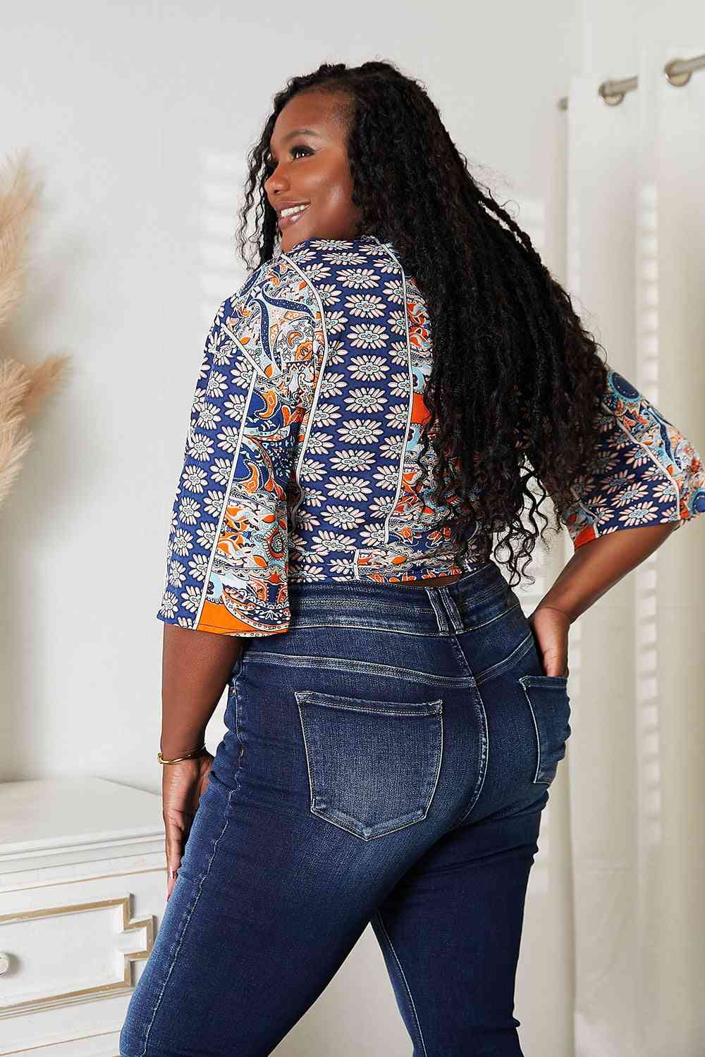 Tie Hem V-Neck Three-Quarter Sleeve Blouse.