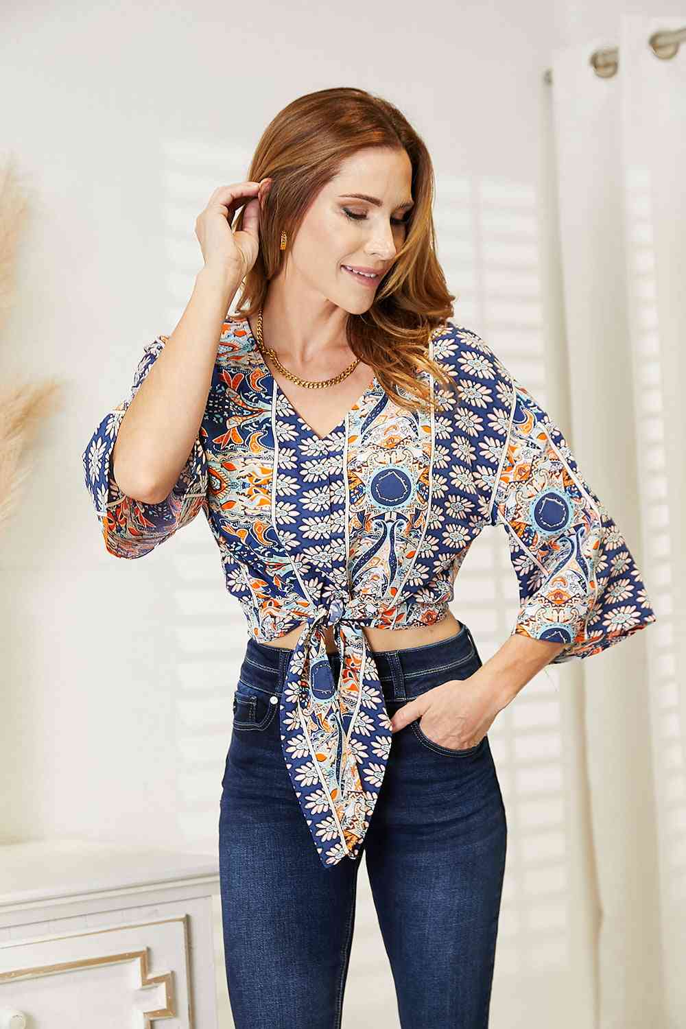 Tie Hem V-Neck Three-Quarter Sleeve Blouse.