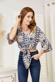Tie Hem V-Neck Three-Quarter Sleeve Blouse.
