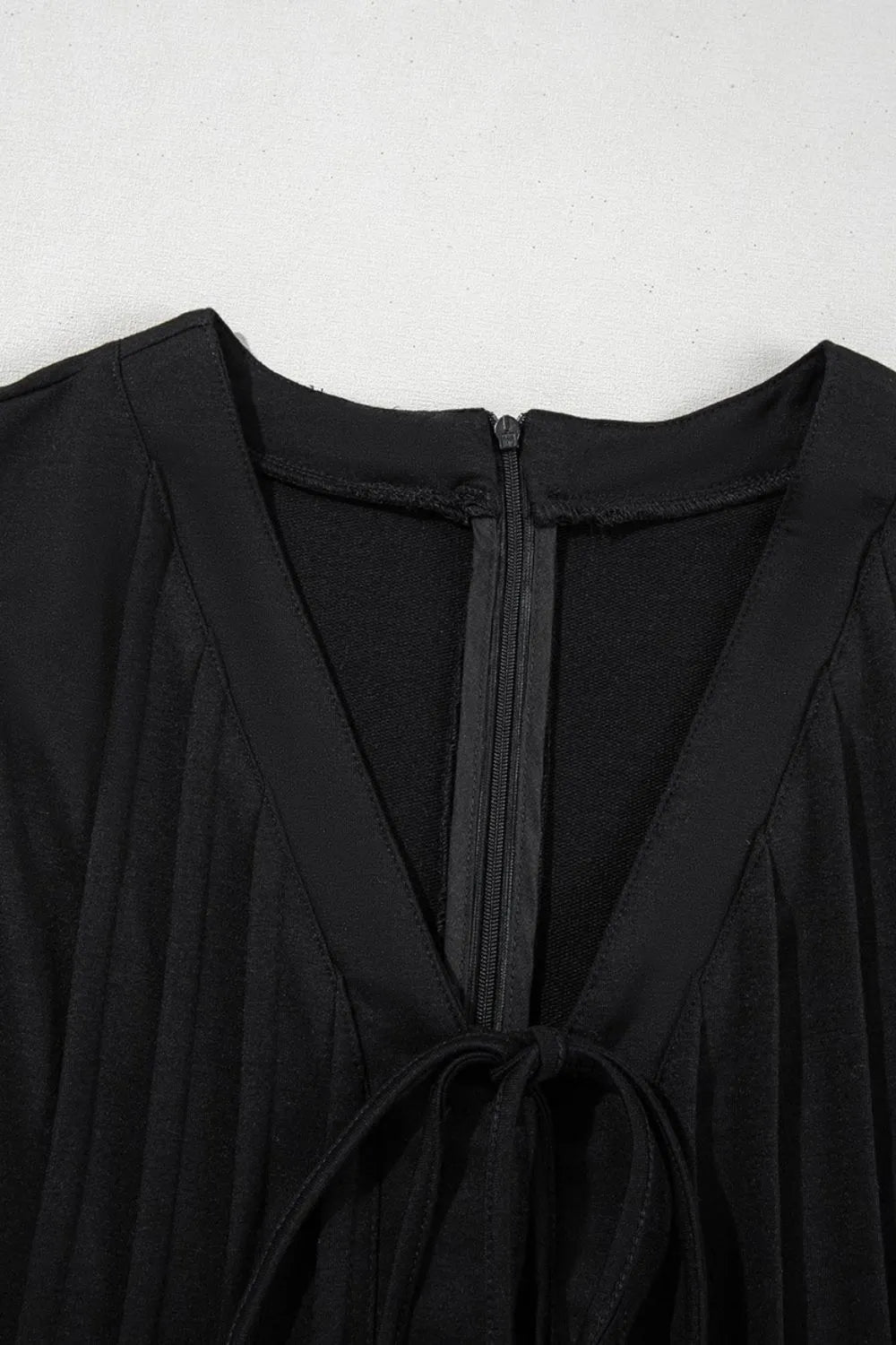 Tie V Neck Pintuck Sleeveless Loose Romper.