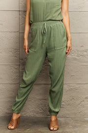 Tie waist long pants with pocket, casual style.