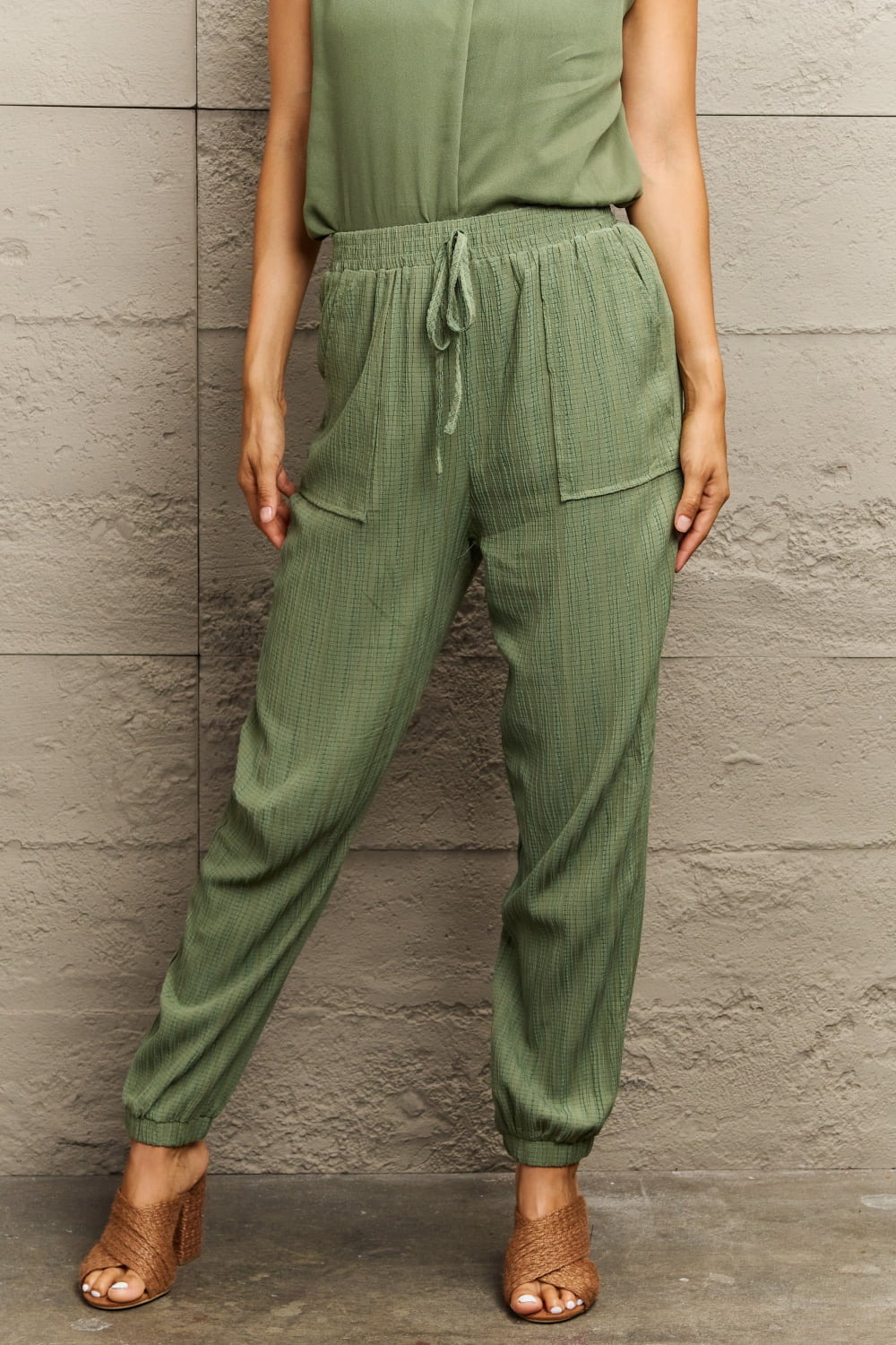 Tie waist long pants with pocket, casual style.