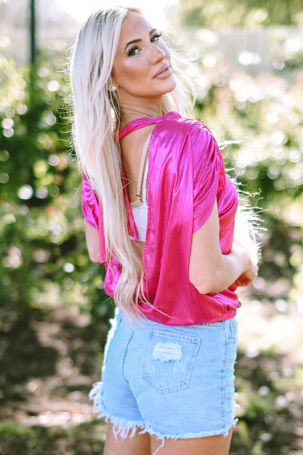 Tied Backless Round Neck Cap Sleeve Blouse.