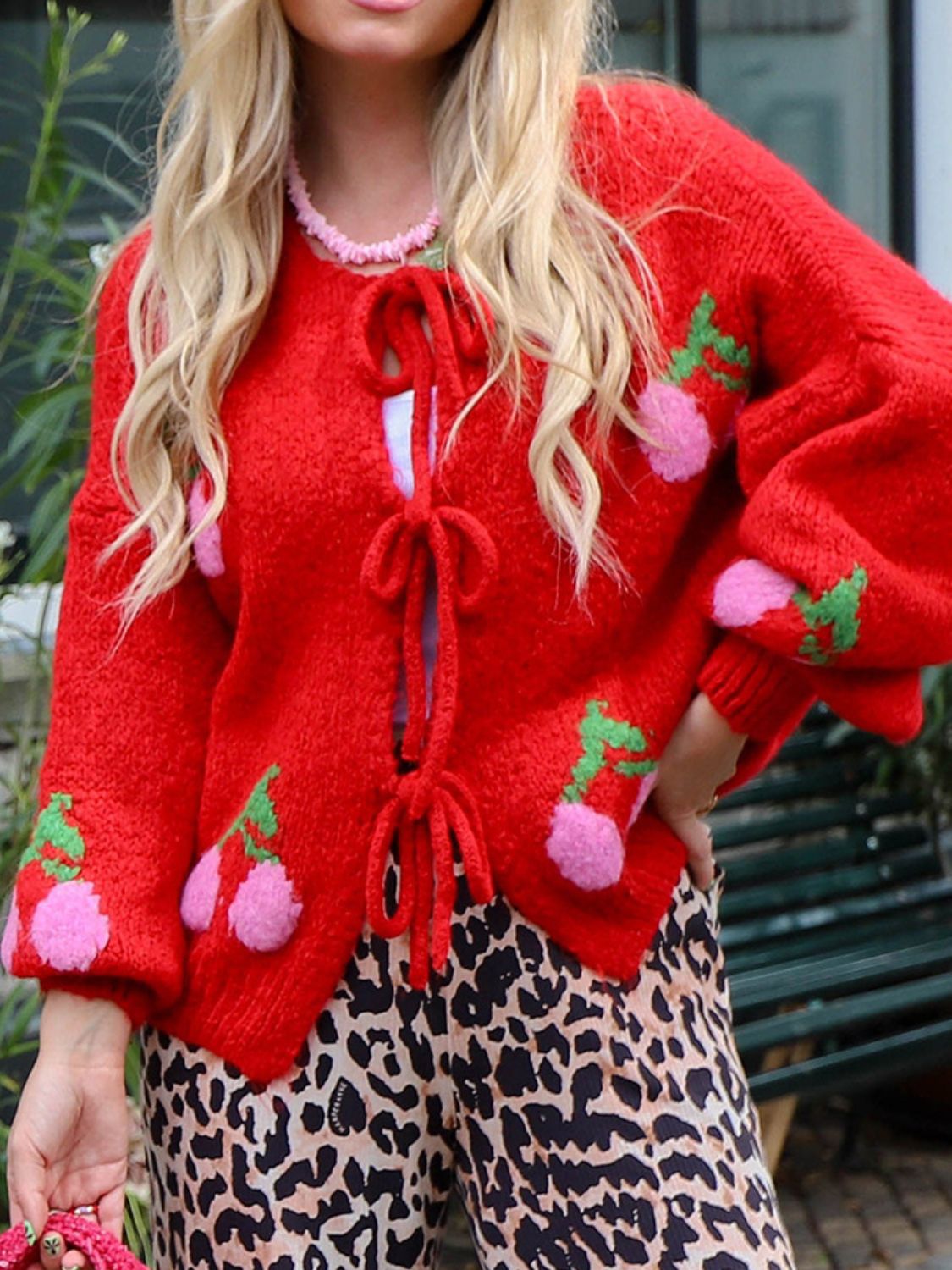 Tied cherry print round neck long sleeve cardigan.