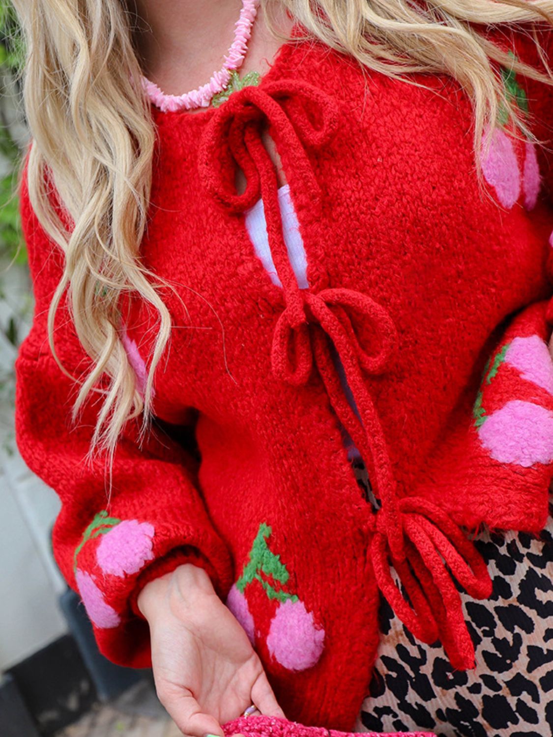Tied cherry print round neck long sleeve cardigan.