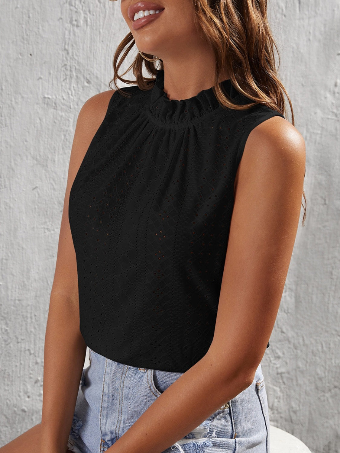 Tied eyelet mock neck tank, opaque and slightly stretchy.