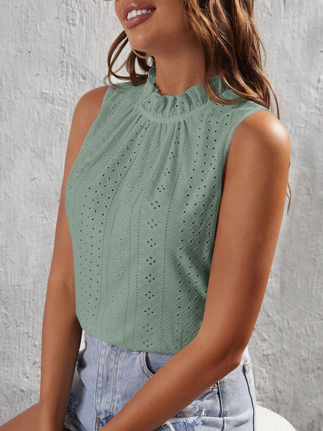 Tied eyelet mock neck tank, opaque and slightly stretchy.
