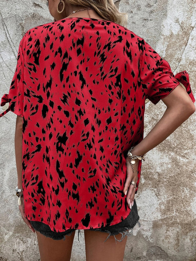 Tied Printed Boat Neck Blouse.