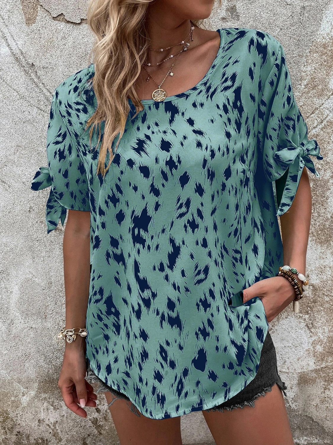 Tied Printed Boat Neck Blouse.
