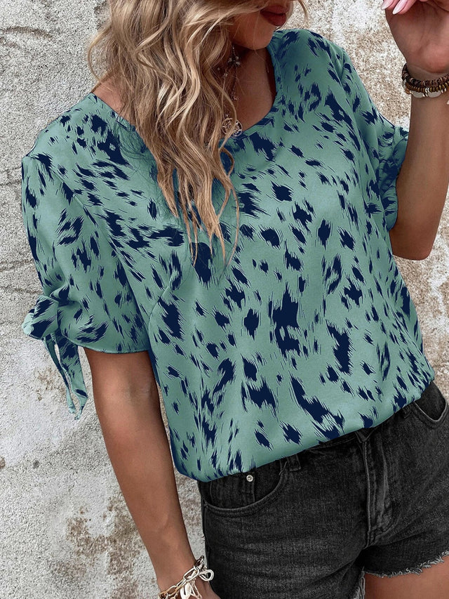 Tied Printed Boat Neck Blouse.